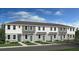 Charming townhome exterior with neutral siding, well-maintained landscaping, and a welcoming entrance at 16554 San Nicola Pl, Lakewood Ranch, FL 34211