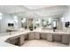 Spacious bathroom with multiple sinks, large mirrors, and ample counter space for a luxurious experience at 17108 Vardon Ter # 401, Bradenton, FL 34211
