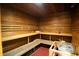 Relaxing sauna featuring wooden benches, creating a tranquil and rejuvenating experience at 17108 Vardon Ter # 401, Bradenton, FL 34211