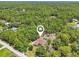 House in wooded area with private pool, ideal for buyers seeking a secluded retreat surrounded by nature's beauty at 18026 Nutcracker Rd, Weeki Wachee, FL 34614