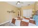 Cozy bedroom with a ceiling fan, neutral walls, and a full sized bed at 18026 Nutcracker Rd, Weeki Wachee, FL 34614