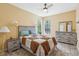 Comfortable bedroom with a ceiling fan, neutral walls, and a full sized bed at 18026 Nutcracker Rd, Weeki Wachee, FL 34614