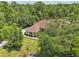Charming single-story home featuring a well-maintained lawn and a covered entrance at 18026 Nutcracker Rd, Weeki Wachee, FL 34614