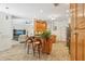 Open kitchen features a breakfast bar, stainless steel appliances, and views into the living area at 18026 Nutcracker Rd, Weeki Wachee, FL 34614