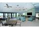 Comfortable community lounge area features modern furnishings and access to outdoor vistas at 2045 Gulf Of Mexico Dr # M1-207, Longboat Key, FL 34228