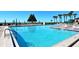 Spacious pool featuring clear blue water and well-maintained facilities, creating an ideal space for recreation and relaxation at 2045 Gulf Of Mexico Dr # M1-207, Longboat Key, FL 34228