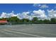 Spacious community tennis courts offer an active lifestyle with beautiful landscaping at 2045 Gulf Of Mexico Dr # M1-207, Longboat Key, FL 34228
