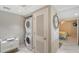 Convenient laundry area with stacked washer and dryer at 2045 Gulf Of Mexico Dr # M1-207, Longboat Key, FL 34228