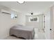 Bright bedroom featuring large windows providing generous natural light at 21152 Higgs Dr, Port Charlotte, FL 33952