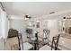 Cozy dining space featuring modern table set and seamless connection to the living area at 21152 Higgs Dr, Port Charlotte, FL 33952