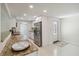 Well-lit kitchen area with stainless steel appliances, granite countertops, and door to exterior at 21152 Higgs Dr, Port Charlotte, FL 33952