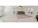 Cozy living area features neutral decor, French doors, and seamless access to the adjacent rooms at 21152 Higgs Dr, Port Charlotte, FL 33952