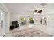 Open concept living space featuring a modern kitchen, dining area, and comfortable seating at 21152 Higgs Dr, Port Charlotte, FL 33952