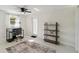 Bright office space with neutral walls, ceiling fan and outdoor access at 21152 Higgs Dr, Port Charlotte, FL 33952