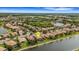 Aerial view of home on a canal in a desirable neighborhood at 212 River Enclave Ct, Bradenton, FL 34212
