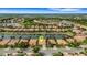Aerial view of the property located on a waterway, surrounded by mature trees at 212 River Enclave Ct, Bradenton, FL 34212