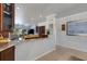 Open concept kitchen featuring granite countertops and stainless steel appliances at 212 River Enclave Ct, Bradenton, FL 34212