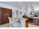 Well-lit kitchen with granite counters, stainless steel appliances, and ample cabinet space at 212 River Enclave Ct, Bradenton, FL 34212