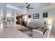 Open living room and kitchen area with lots of natural light and modern finishes at 212 River Enclave Ct, Bradenton, FL 34212