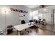 Spacious office area with ample workspace, bright lighting, and a functional layout for productivity at 212 River Enclave Ct, Bradenton, FL 34212