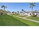 Manicured lawns and sidewalks wind through this quiet condo community at 2207 Sunset Dr # E5, Bradenton, FL 34207