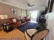 Bright and airy living room with stylish furnishings, wood floors, and sliding glass doors at 2207 Sunset Dr # E5, Bradenton, FL 34207