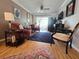 Cozy living room featuring comfortable seating, natural light, and seamless access to outdoor space at 2207 Sunset Dr # E5, Bradenton, FL 34207
