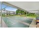 Covered shuffleboard courts offer outdoor recreation at this condo community at 2207 Sunset Dr # E5, Bradenton, FL 34207