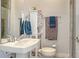 Bathroom featuring a pristine white sink and stylish fixtures at 235 Cocoanut Ave # 108B, Sarasota, FL 34236