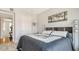 Comfortable bedroom with neutral walls and view to another room at 235 Cocoanut Ave # 108B, Sarasota, FL 34236