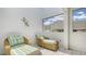 Relaxing patio featuring wicker furniture and open view at 235 Cocoanut Ave # 108B, Sarasota, FL 34236