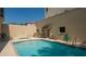 Relaxing community pool area with nearby lounge chairs and shade at 235 Cocoanut Ave # 108B, Sarasota, FL 34236