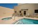 Community pool and hot tub for relaxation with nearby seating at 235 Cocoanut Ave # 108B, Sarasota, FL 34236