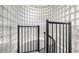 Glass block wall creating a light filled staircase between floors of the home at 235 Cocoanut Ave # 108B, Sarasota, FL 34236