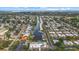 This high up aerial view highlights a well-maintained residential area with waterfront access and great views at 2749 Riverbluff Pl # V65, Sarasota, FL 34231