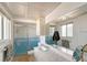 This bright bathroom features a shower/tub combination with sliding glass doors and updated sink at 3705 S School Ave # 3, Sarasota, FL 34239