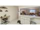 Eat-in bar looks into the living area of this lovely home at 3705 S School Ave # 3, Sarasota, FL 34239