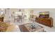Spacious living and dining area with tile floors and views of the kitchen for easy entertaining at 3705 S School Ave # 3, Sarasota, FL 34239