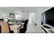 Open-concept living space with dining area and comfortable living room at 3911 39Th W Ave, Bradenton, FL 34205