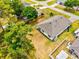 Aerial view of a backyard showing a large, well-kept lawn and partial fencing at 3924 Candia Ave, North Port, FL 34286
