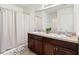 Bathroom featuring double sinks, granite countertops, and a shower/tub combination at 3924 Candia Ave, North Port, FL 34286