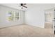 Bright bedroom with a ceiling fan and a window at 3924 Candia Ave, North Port, FL 34286