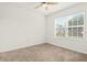Neutral bedroom with a large window with bright, natural light at 3924 Candia Ave, North Port, FL 34286
