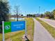 Welcome to Centennial Park! Featuring pristine signage, scenic walking path, and lush greenery at 3924 Candia Ave, North Port, FL 34286