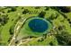 Scenic aerial shot of a popular swimming spot in a recreational area surrounded by lush greenery at 3924 Candia Ave, North Port, FL 34286
