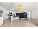 Open concept kitchen featuring stainless steel appliances and a breakfast bar with seating at 3924 Candia Ave, North Port, FL 34286
