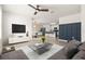 Spacious living room with modern decor, tile flooring, and an open layout at 3924 Candia Ave, North Port, FL 34286