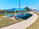 Covered picnic area with tables for outdoor dining and recreation at 3924 Candia Ave, North Port, FL 34286