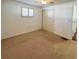 Bedroom featuring neutral carpet, ceiling fan, and sliding door closet at 415 Oakwood W Blvd, Sarasota, FL 34237