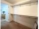 Large closet with shelving and rod for ample storage in the room at 415 Oakwood W Blvd, Sarasota, FL 34237